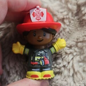 Fisher-Price Little People Girl fireman figure